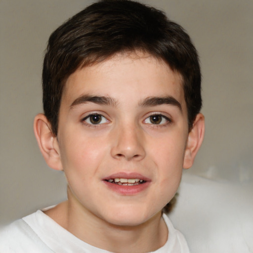 Joyful white child male with short  brown hair and brown eyes