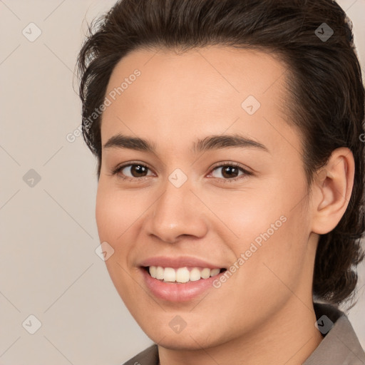 Joyful white young-adult female with medium  brown hair and brown eyes