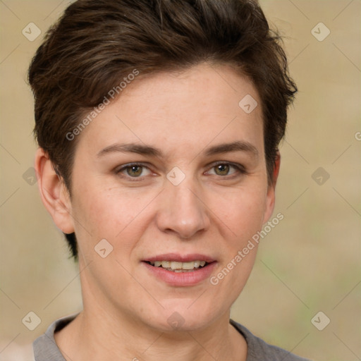 Joyful white adult female with short  brown hair and grey eyes