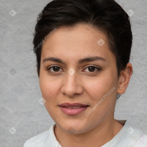 Joyful white young-adult female with short  brown hair and brown eyes