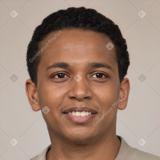 Joyful black young-adult male with short  black hair and brown eyes