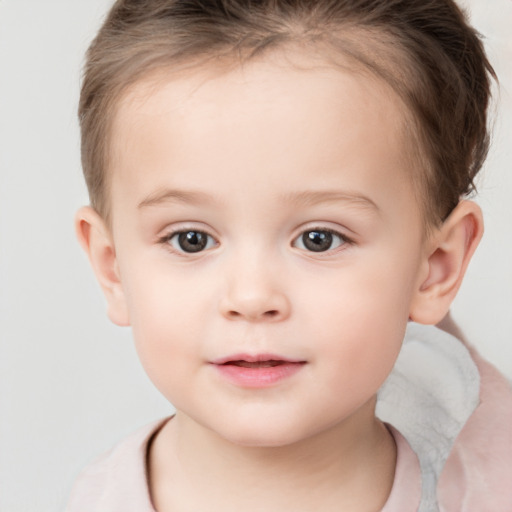 Neutral white child female with short  brown hair and brown eyes