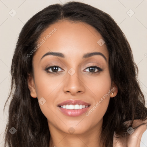 Joyful latino young-adult female with long  brown hair and brown eyes