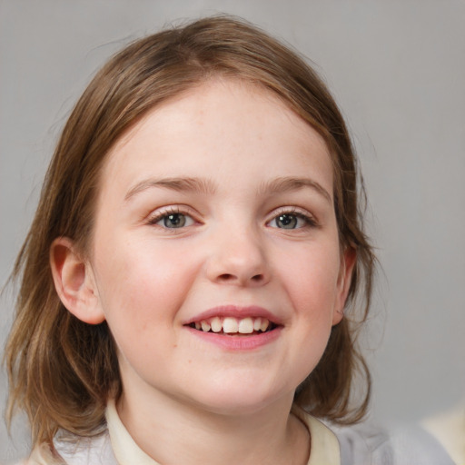 Joyful white child female with medium  brown hair and blue eyes