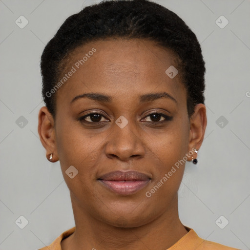 Joyful black young-adult female with short  brown hair and brown eyes