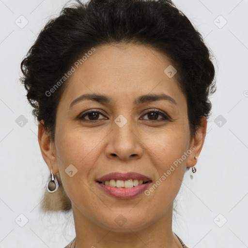 Joyful white adult female with short  brown hair and brown eyes