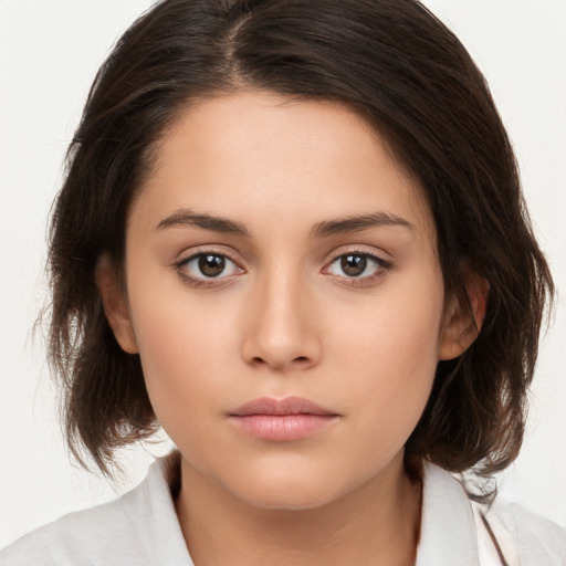 Neutral white young-adult female with medium  brown hair and brown eyes