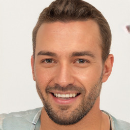 Joyful white young-adult male with short  brown hair and brown eyes