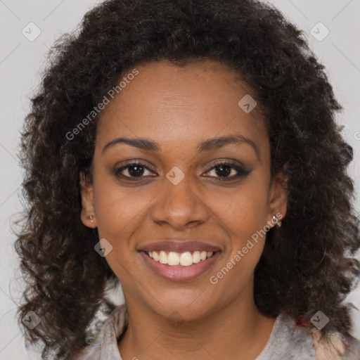 Joyful black young-adult female with medium  brown hair and brown eyes