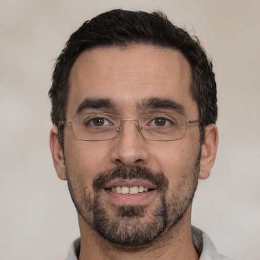 Neutral white adult male with short  black hair and brown eyes