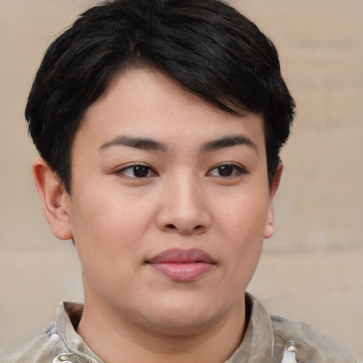 Joyful asian young-adult female with short  brown hair and brown eyes