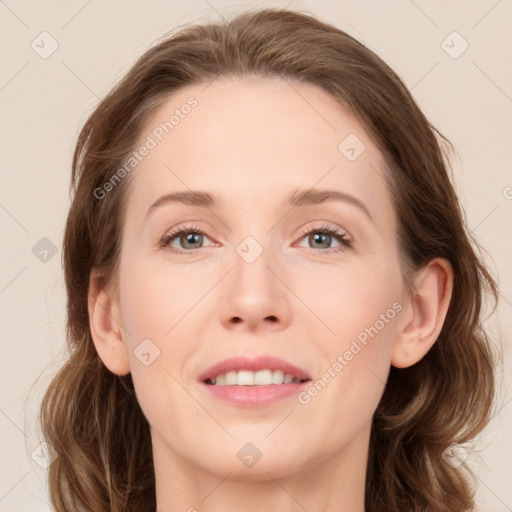 Joyful white young-adult female with medium  brown hair and green eyes