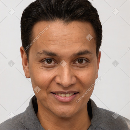 Joyful white adult male with short  brown hair and brown eyes