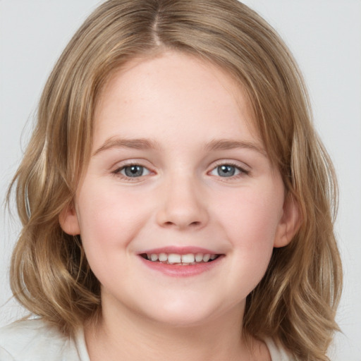 Joyful white child female with medium  brown hair and grey eyes