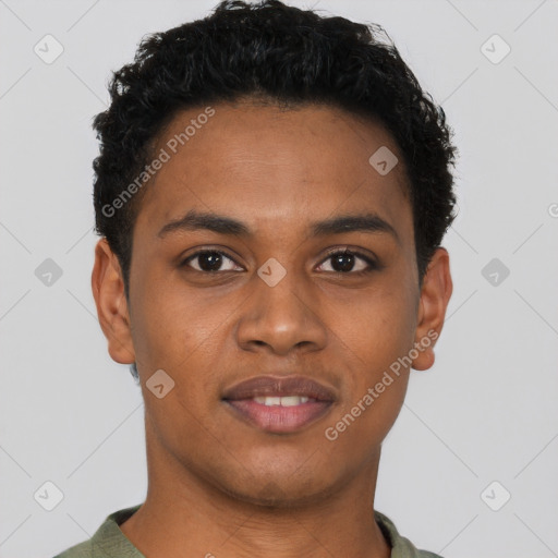 Joyful black young-adult male with short  brown hair and brown eyes