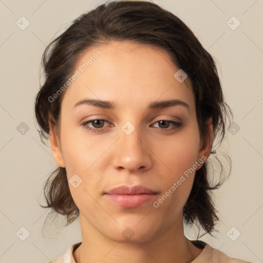 Neutral white young-adult female with medium  brown hair and brown eyes