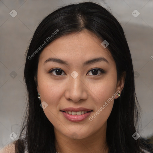 Joyful asian young-adult female with long  brown hair and brown eyes