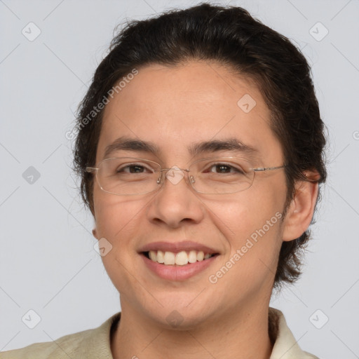 Joyful white adult female with medium  brown hair and brown eyes