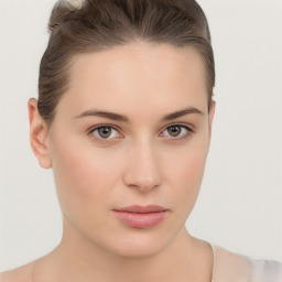 Neutral white young-adult female with short  brown hair and brown eyes