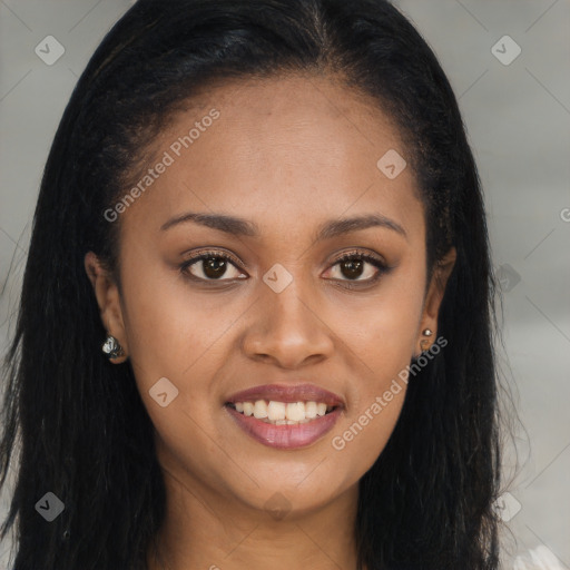 Joyful black young-adult female with long  brown hair and brown eyes