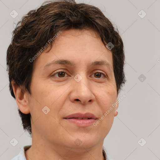 Joyful white adult female with short  brown hair and brown eyes