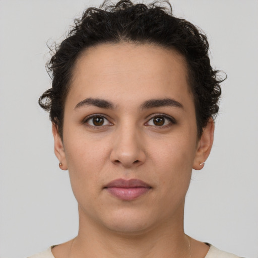 Neutral white young-adult female with short  brown hair and brown eyes