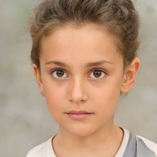 Neutral white child female with short  brown hair and brown eyes