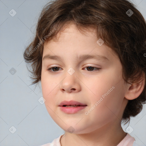 Joyful white child female with medium  brown hair and brown eyes