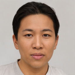 Neutral asian young-adult male with short  brown hair and brown eyes