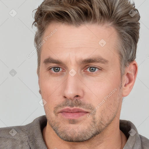 Neutral white adult male with short  brown hair and brown eyes