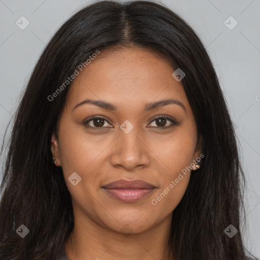 Joyful black young-adult female with long  brown hair and brown eyes