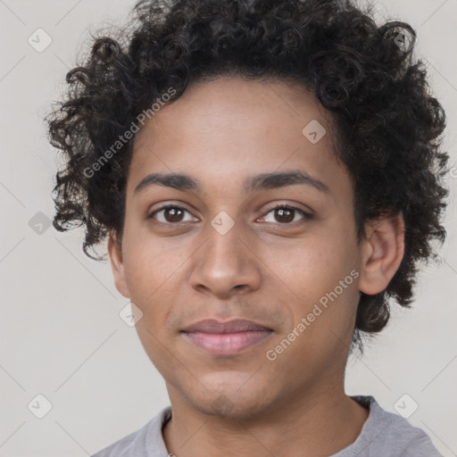 Joyful black young-adult male with short  brown hair and brown eyes