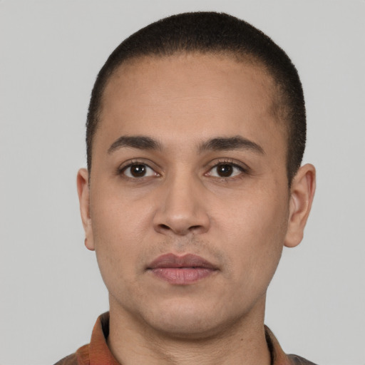 Neutral latino young-adult male with short  brown hair and brown eyes