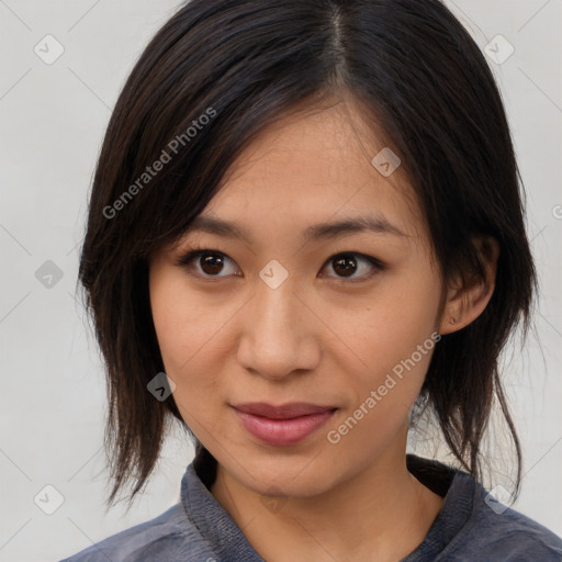 Joyful asian young-adult female with medium  brown hair and brown eyes