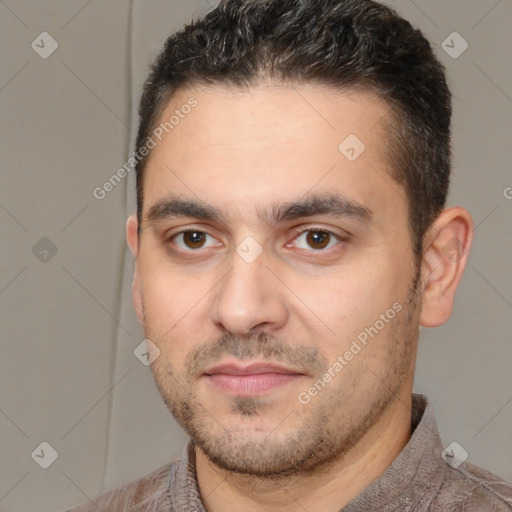 Joyful white young-adult male with short  brown hair and brown eyes