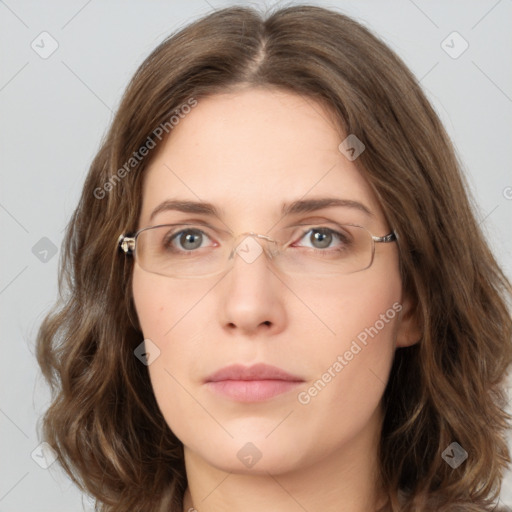 Neutral white young-adult female with long  brown hair and green eyes