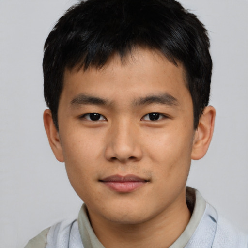 Neutral asian young-adult male with short  brown hair and brown eyes