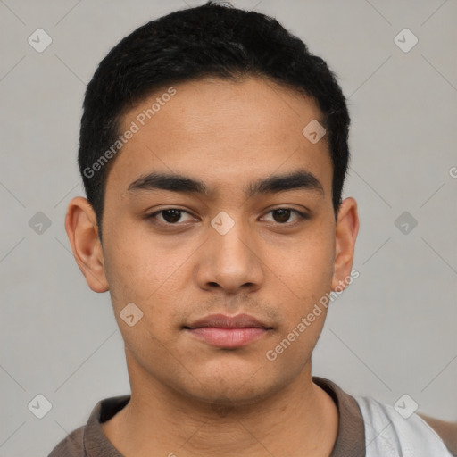 Neutral latino young-adult male with short  black hair and brown eyes