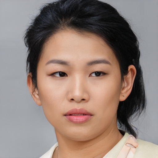 Neutral asian young-adult female with medium  black hair and brown eyes