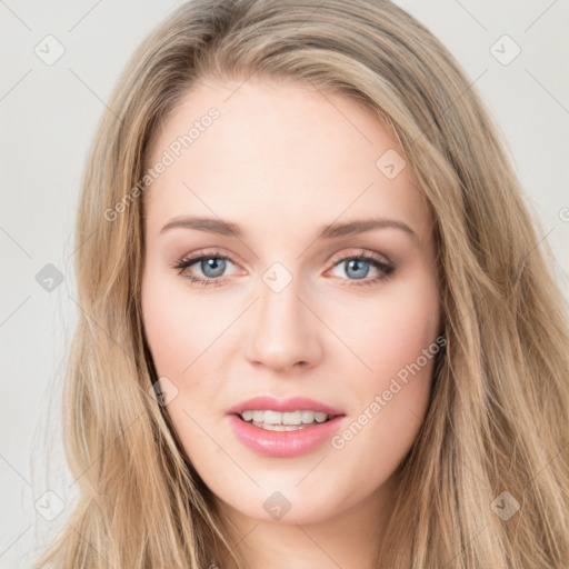 Joyful white young-adult female with long  brown hair and blue eyes