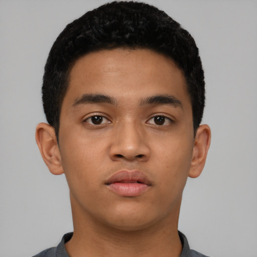 Neutral latino young-adult male with short  black hair and brown eyes
