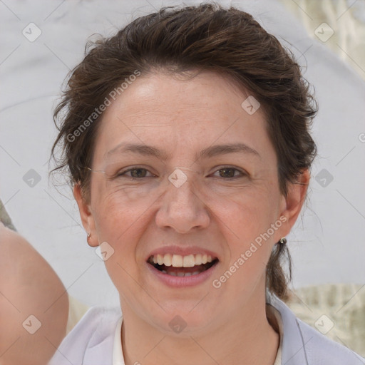 Joyful white adult female with short  brown hair and brown eyes