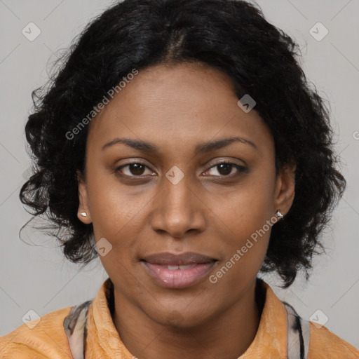 Joyful latino adult female with medium  brown hair and brown eyes