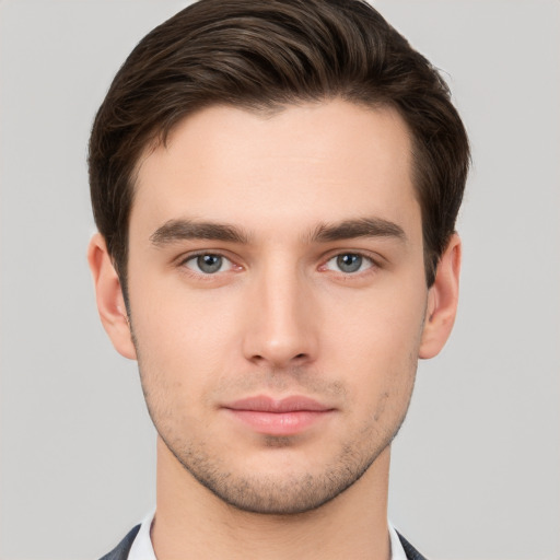 Neutral white young-adult male with short  brown hair and brown eyes