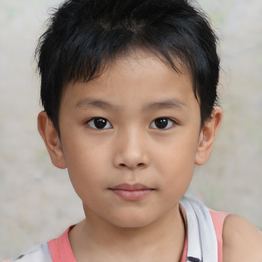 Neutral asian child male with short  brown hair and brown eyes