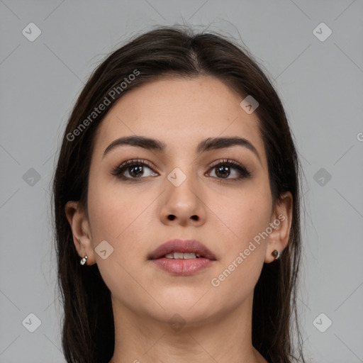 Neutral white young-adult female with long  brown hair and brown eyes