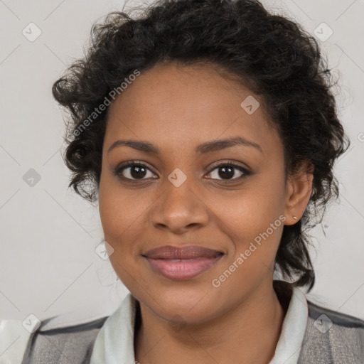 Joyful black young-adult female with long  brown hair and brown eyes