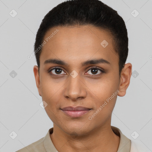 Joyful latino young-adult female with short  black hair and brown eyes