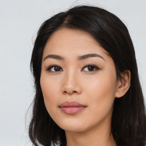 Neutral latino young-adult female with long  black hair and brown eyes