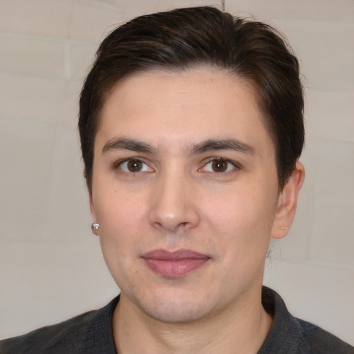 Joyful white young-adult male with short  brown hair and brown eyes